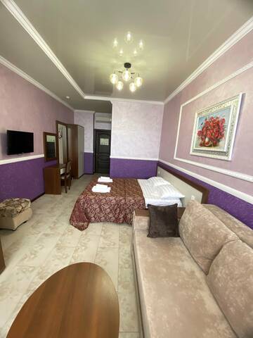 Стандартный четырехместный номер в Гостинице Юнона